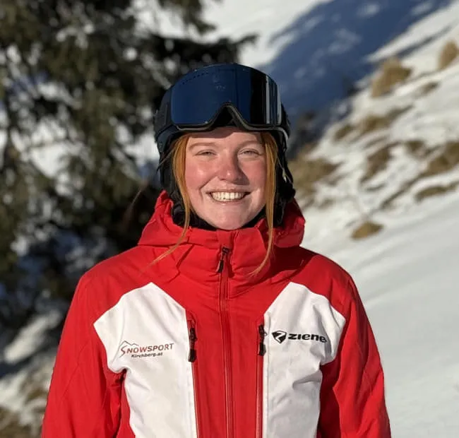 Person in ski gear on snowy mountain slope